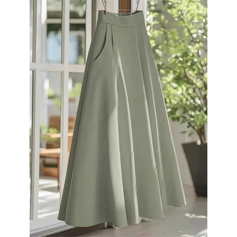 กระโปรงยาวทรงเอวสูงสีพื้นสำหรับผู้หญิงฤดูร้อน กระโปรงยาวลำลองสำหรับผู้หญิงระดับไฮเอนด์ แฟชั่นสไตล์ฝรั่งเศสปี 2025 กระโปรงยาวทรงแม็กซี่เนื้อบาง