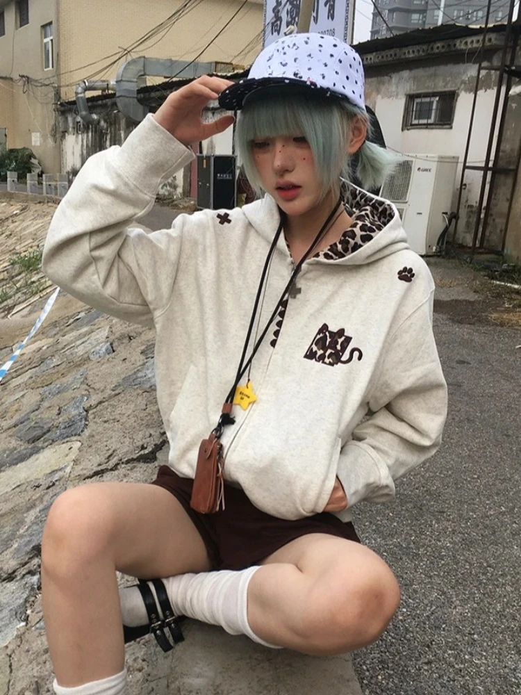 سترات مموهة مع قلنسوة للنساء 2000s معاطف كلاسيكية أمريكية بلوزات من الفرو الصناعي ملابس خروج غير رسمية فضفاضة أنيقة #1