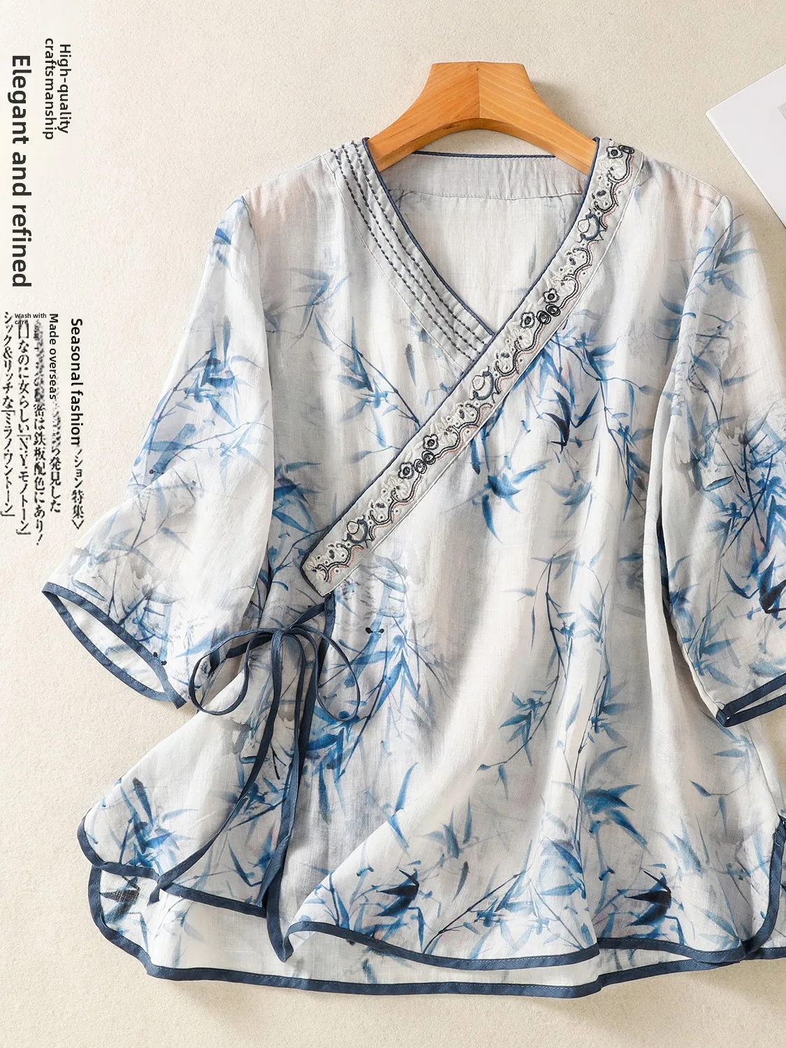 

High-End Summer Ethnic Print irt Loose Fit V-Ne Seven-Quarter Sve Slimming Side Button Tea Costume Top Women's Faion