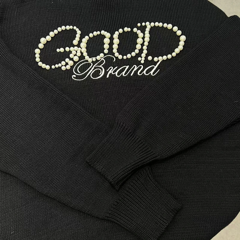 Nuevo estilo coreano buen Top Pearl Knight suéter de punto abotonado de un solo hombro cuello redondo Goodbrand pulóver suelto Casual Stock