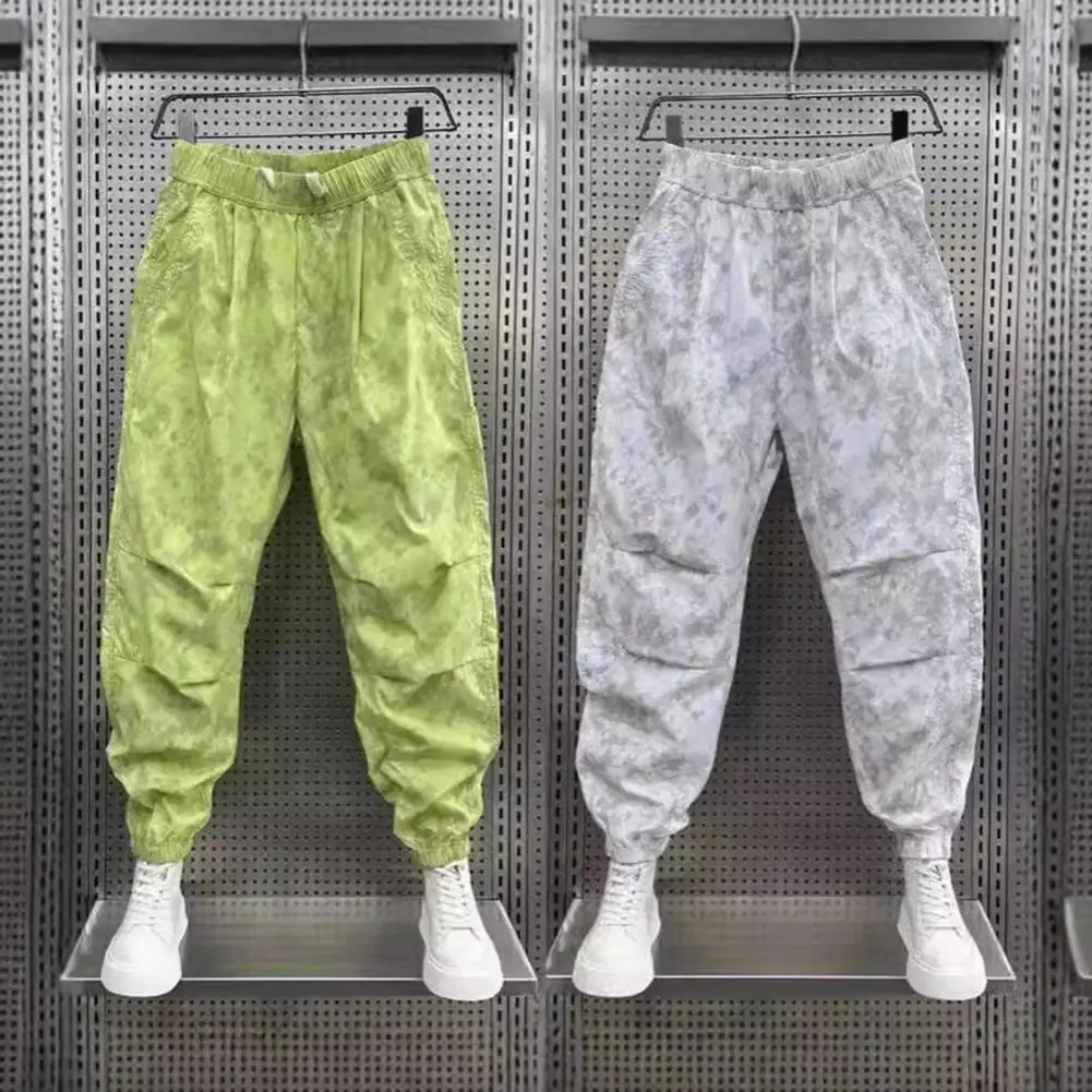 กางเกงโพลีเอสเตอร์คุณภาพสูง Baggy Jogger กางเกงพร้อมสายรัดเอวกระเป๋าขนาดใหญ่สําหรับกีฬาผู้ชายสไตล์ Street สําหรับ GYM