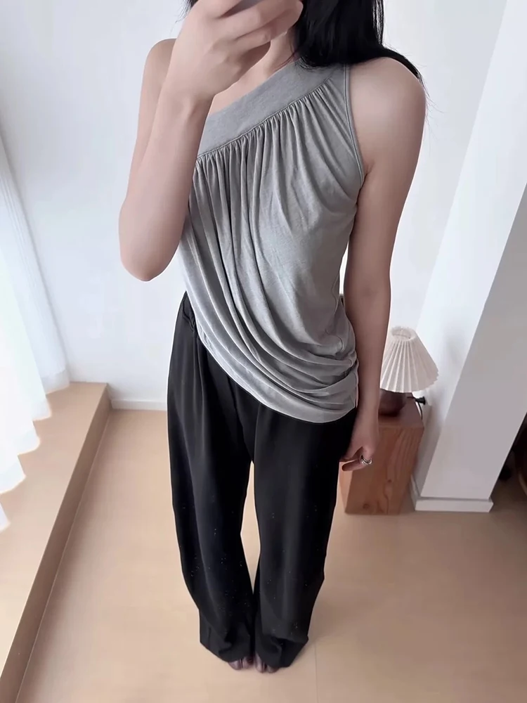 Sexy off-shoulder and halter top for women. Loose pleated design for slimming effect. Sleeveless top. 2026 new style.
