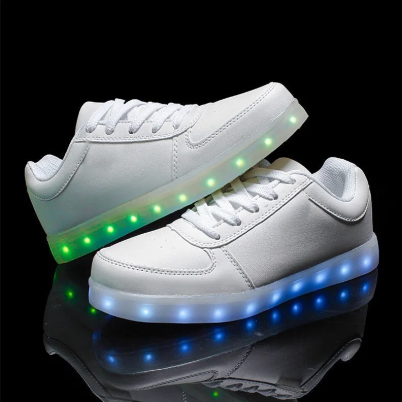 Nowa moda LED lekkie buty Usb Charge dla kobiet i mężczyzn świecące trampki pary deskorolka sportowa buty Zapatos Mujer