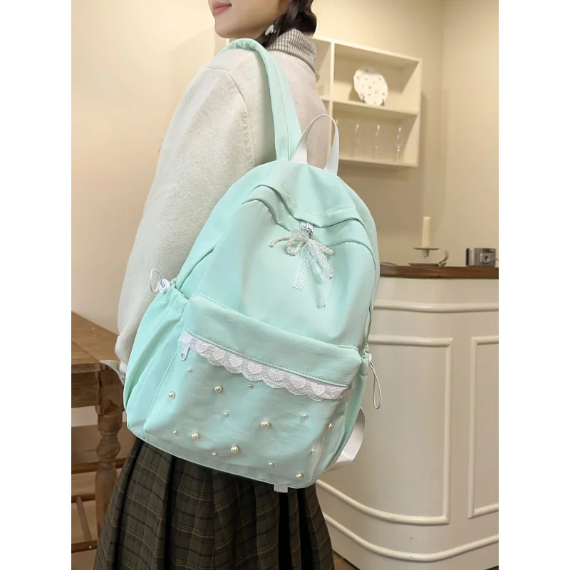 

Sweet girly lace and pearl backpack for junior high and high school students, female student schoolbag, large capacity lightweig