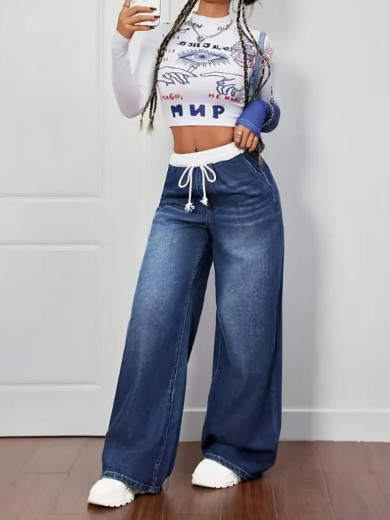 جينز مستقيم الساق بتصميم ريترو للخريف على الطراز الأمريكي بتصميم جديد مريح وواسع الساق للنساء من قماش الدنيم