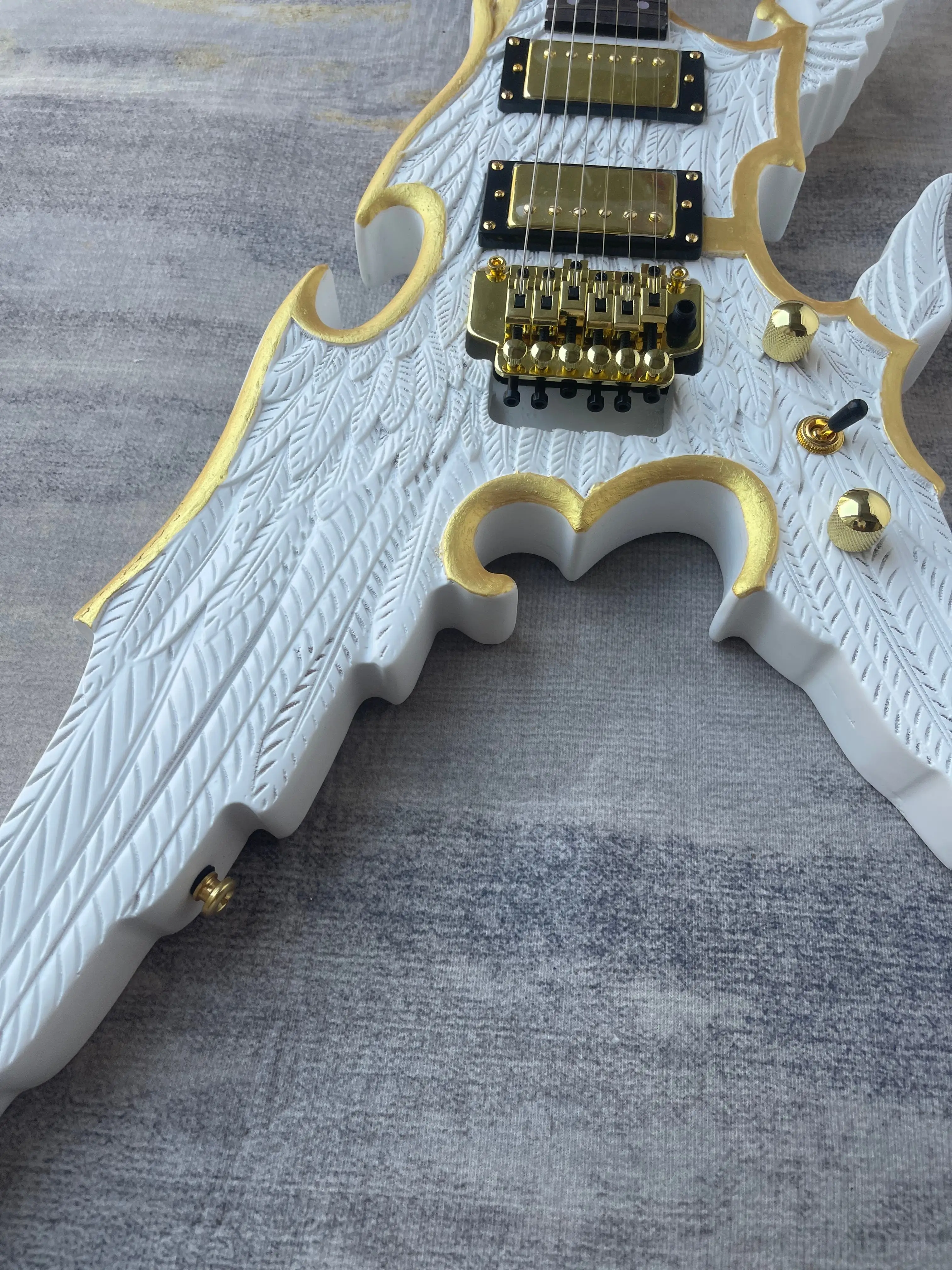 6 String Wing Carved Irregular V Shape Electric Guitar White Gold Trim HH Humbuckers Double Lock Tremolo Metal Free Delivery