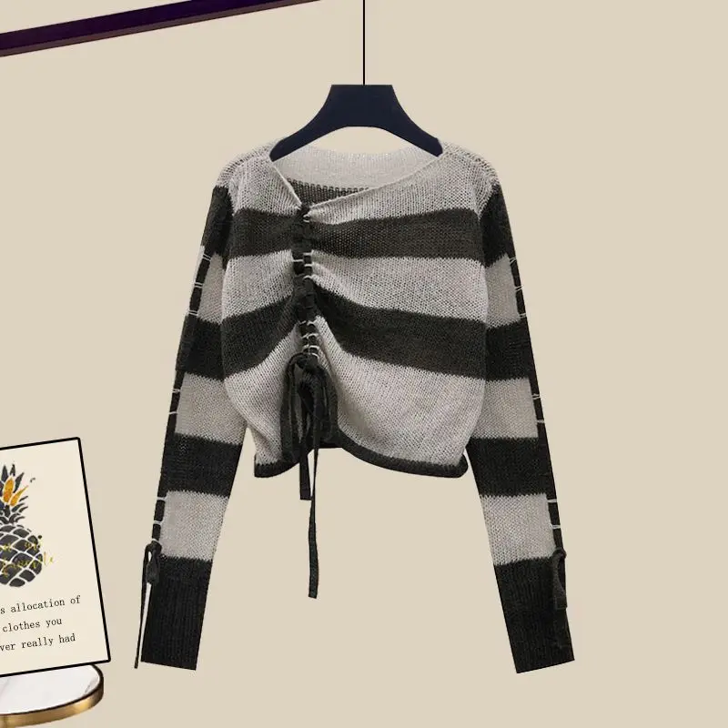 Color blocking striped knitted sweater early autumn new style drawstring French design niche long sleeved sweater trend