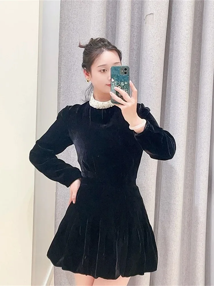 S Home Winter 2025 تنورة ماكسي مخملية عالية الخصر مزينة باللؤلؤ وحجر الراين or Dr Slimming Bla Dr Commute Sle