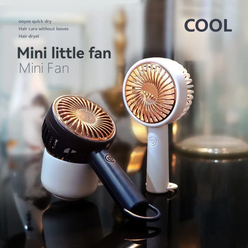 2024 New Handheld Small Fan Strong Wind Anti Slip Properties Portable Outdoor Student Dormitory Mini USB Rechargeable Fan