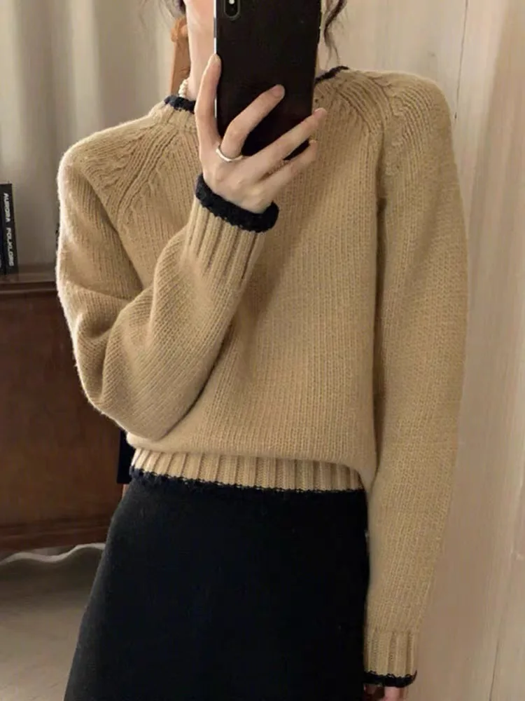 Autumn and winter women\'s casual solid color round neck long sleeved loose sweater