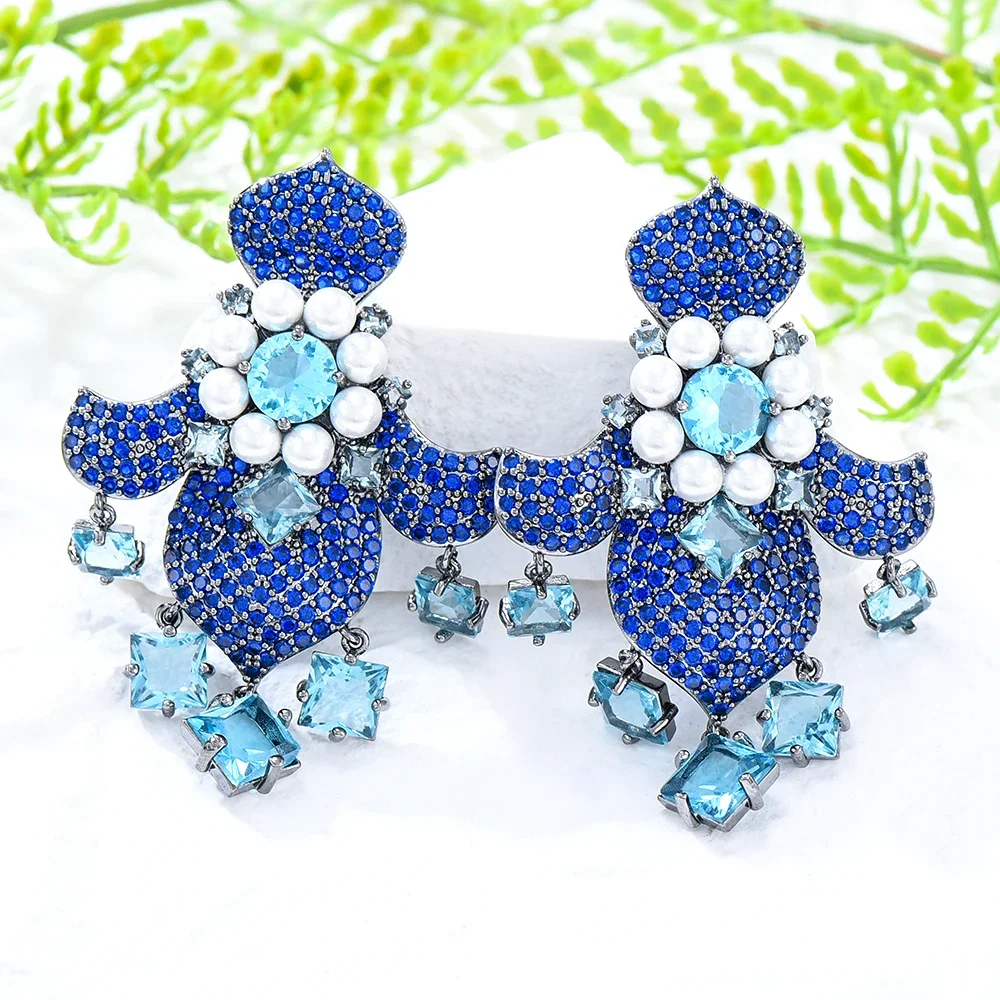 

Soramoore New Fashion Luxury Shiny Blue Drop Earrings for Women Trendy Elegant Created Big Simulated Pear Earrings Wholesale