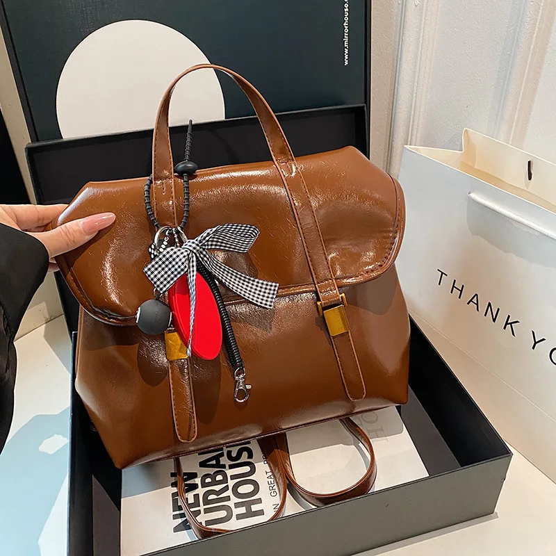 

Women's Solid Color Backpack with Bag Charm PU Leather Backpack Brown Vintage Shoulder Bag for Daily Used