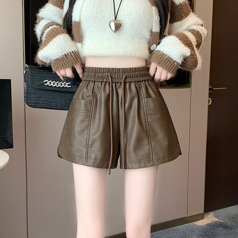 

2023 Women Autumn Winter Fashion PU Faux Leather Shorts Female Pockets High Waist Shorts Ladies Loose Wide Leg Shorts U584