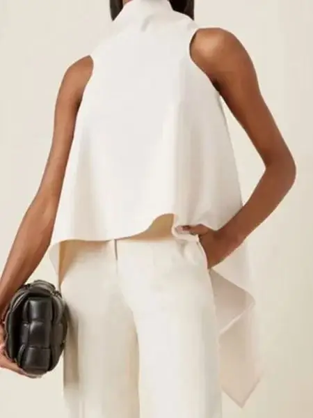 ยุโรปและสหรัฐอเมริกาฤดูใบไม้ผลิและฤดูร้อนไม่สม่ําเสมอ Hem เสื้อแขนกุดอารมณ์เสื้อเชิ้ตสีขาวผู้หญิง