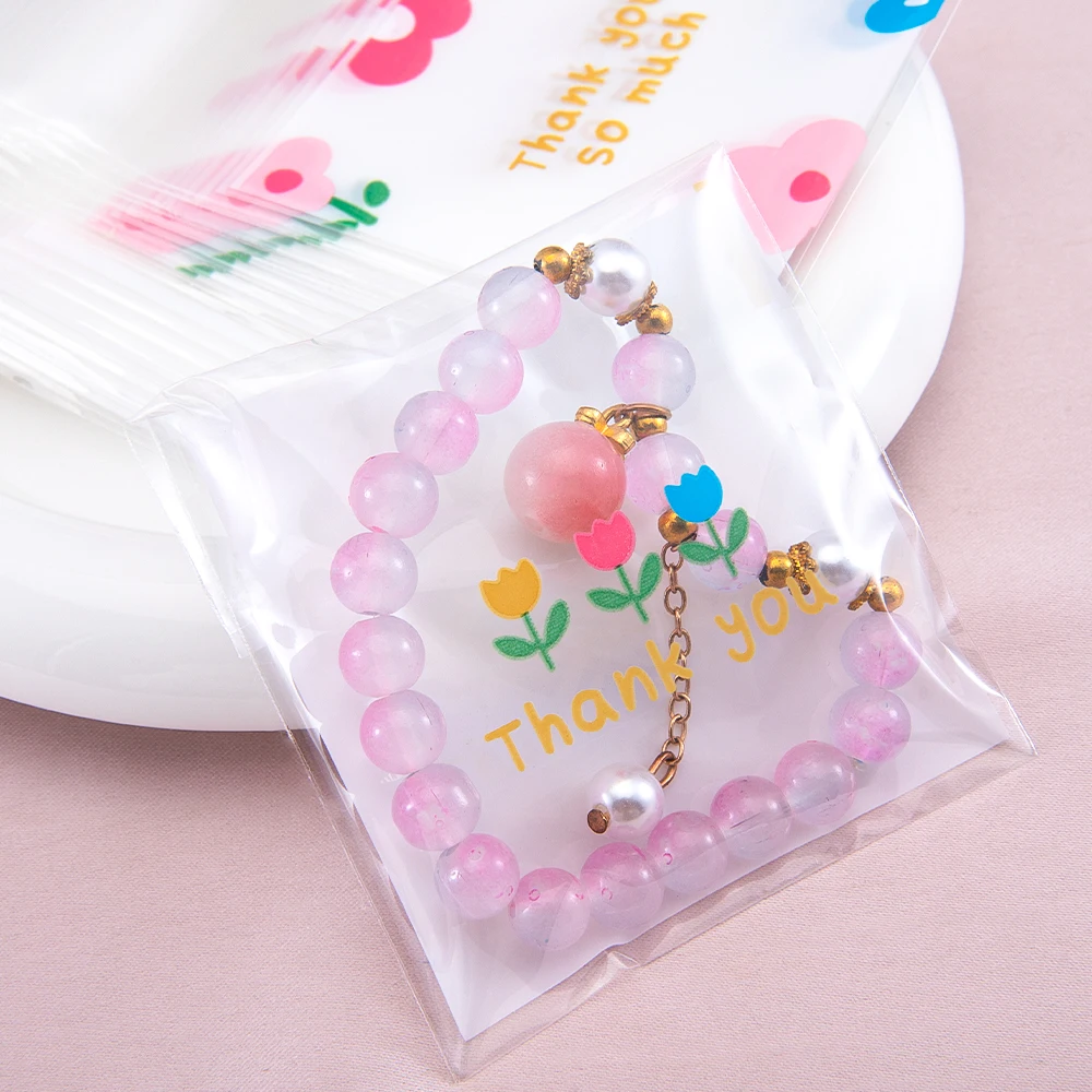 50pcs 7x7cm Flower Transparent Self-Adhesive Pouches Plastic Packing Bags for Biscuits Candy Cookies Jewelry Gift Packaging