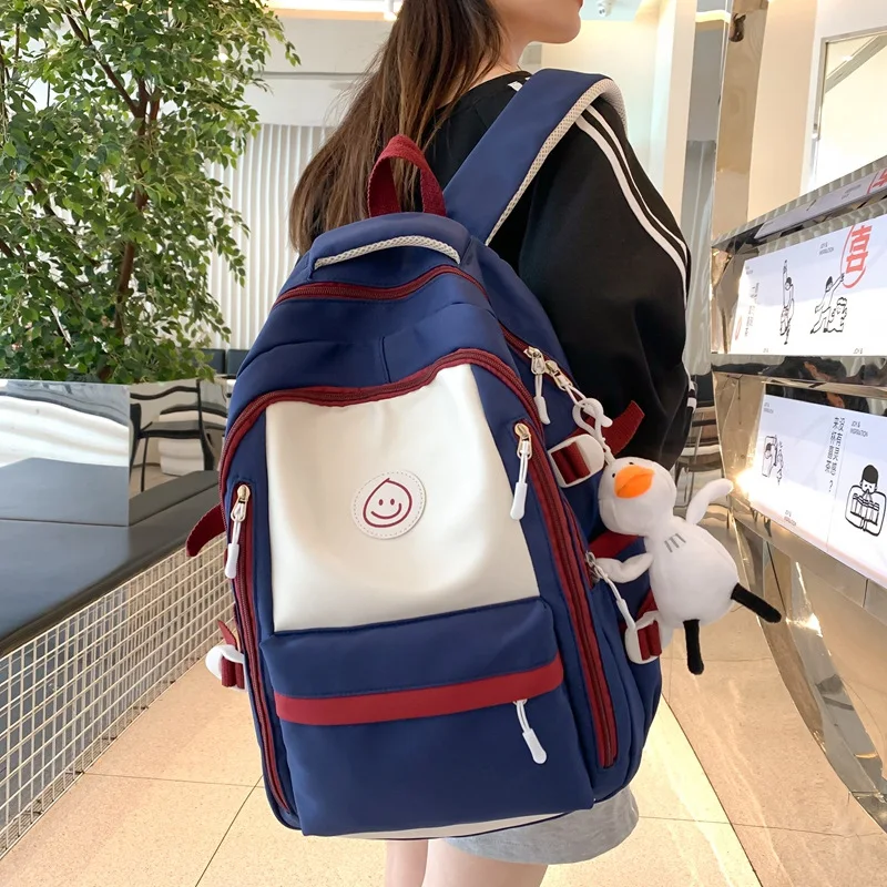 

Student Backpack Korean Version Fashionable Color Blocking Japanese School Large Capacity Travel Computer Sweet Trend