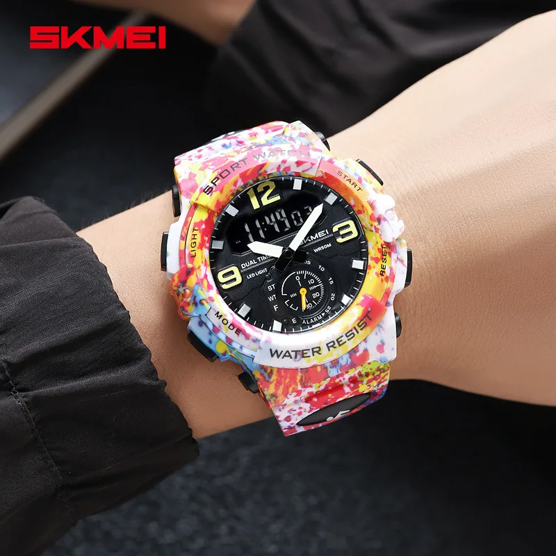 Skmei แฟชั่นที่มีสีสันกีฬาแทรกคู่นาฬิกาอิเล็กทรอนิกส์นาฬิกานักเรียนมัลติฟังก์ชั่กันน้ําส่องสว่างนาฬิกาอิเล็กทรอนิกส์