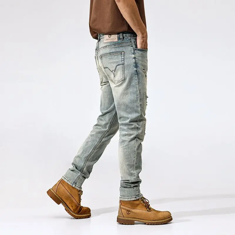 

JXNS162 The new American tide leisure hole jeans male Slim straight hundred washed retro small feet high quality
