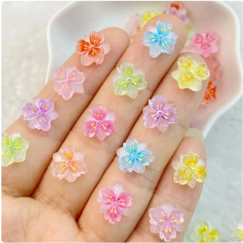 20 sztuk lód przezroczysty Sakura 3D Arcylic ozdoby do paznokci Charms Kawaii akcesoria kolorowe pięciopłatkowe kwiaty części do Manicure