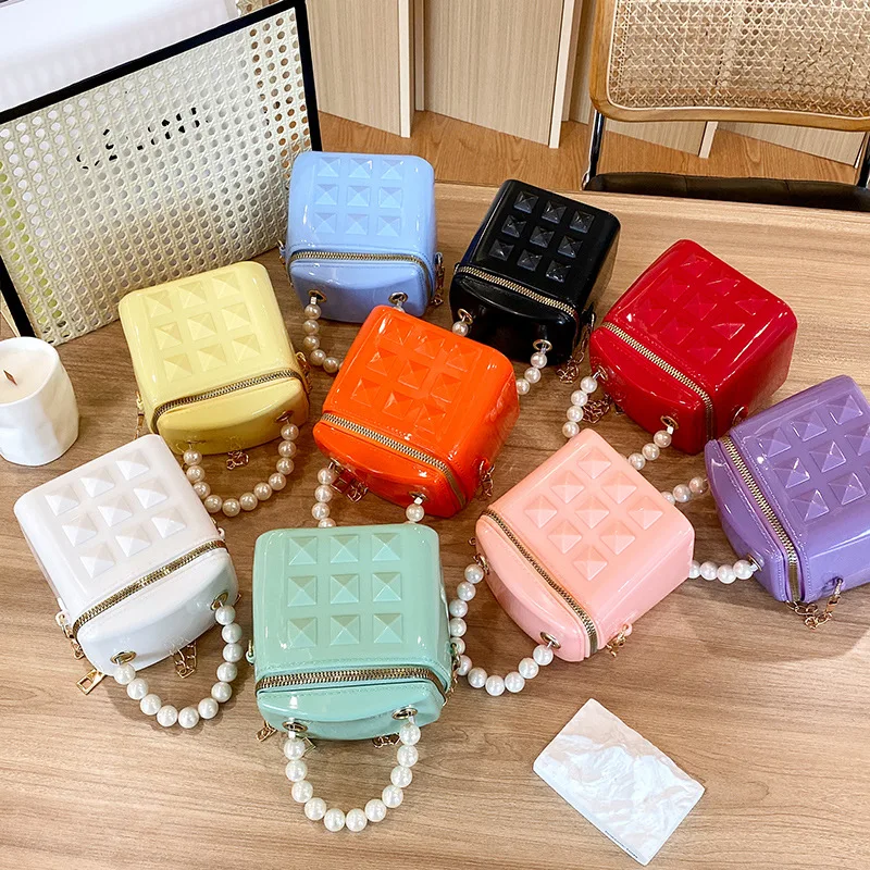 Women\'s Bag New Fashion Casual Rivet Embossed Chain Pearl Handheld Jelly Bag 3D Bucket Makeup Bag bags for women