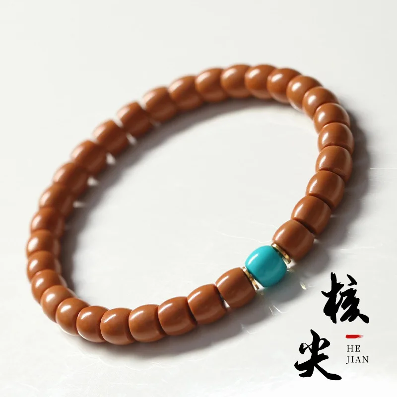 

Wild Olive Pit Pointed Wall Monkey Bead Bracelet