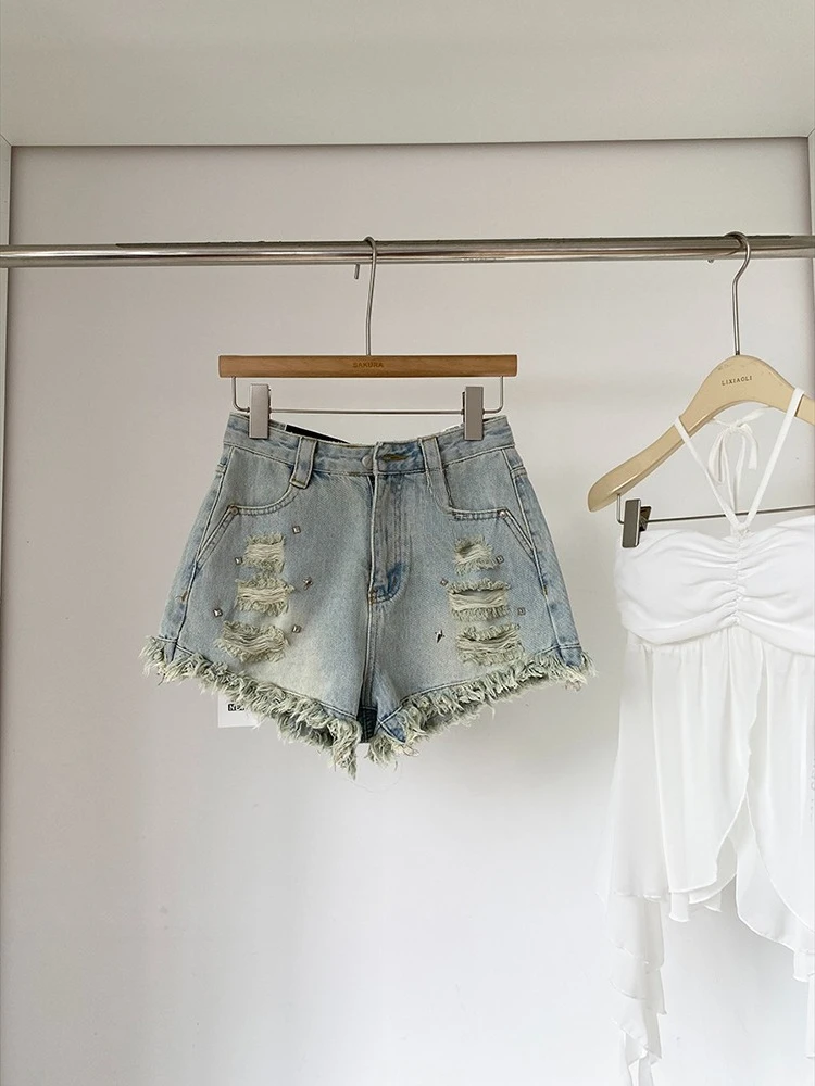 2025 summer new design sense niche ripped edge women's trend high waisted denim shorts personality versatile hot pants