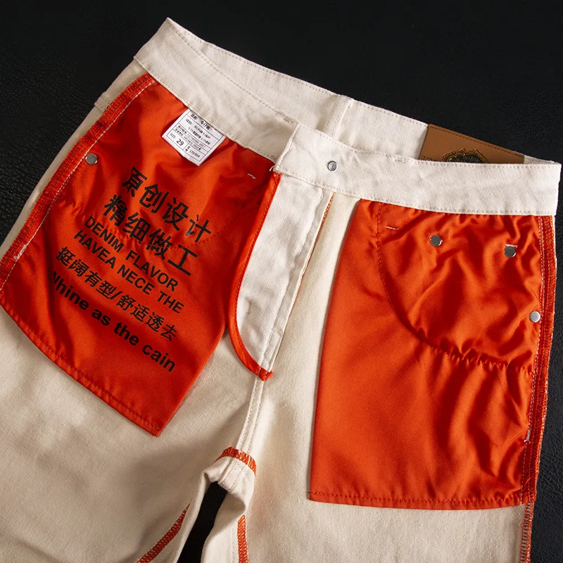 Gebroken witte jeans voor heren, herfst nieuwe trendy stijl, knap en veelzijdig, casual eenvoudige high-end slim fit broek met rechte pijpen