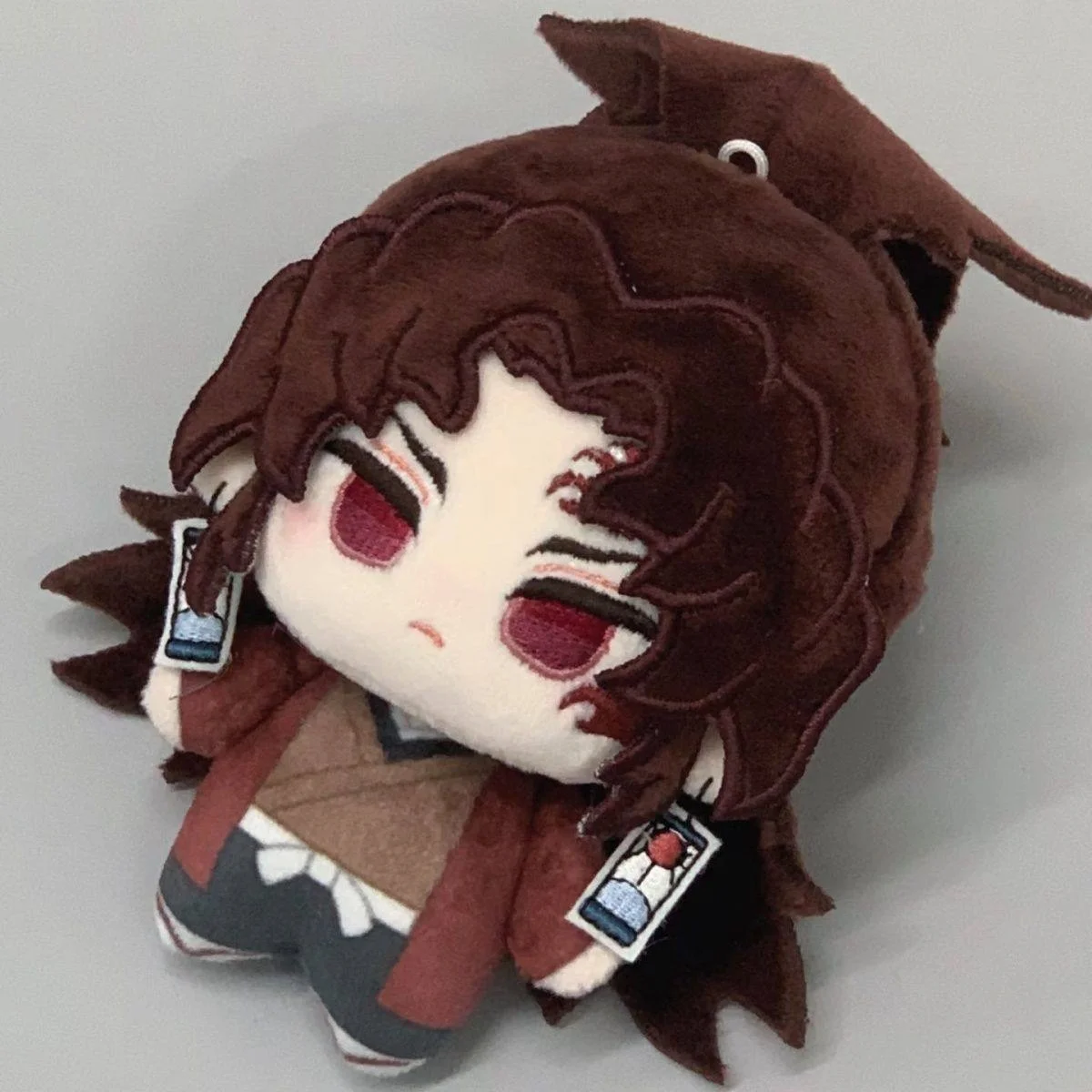 En Stock relleno 10cm Anime Demon Slayer Kokushibo Tokito Muichiro muñeco de peluche Cos mochila colgante juguetes regalos