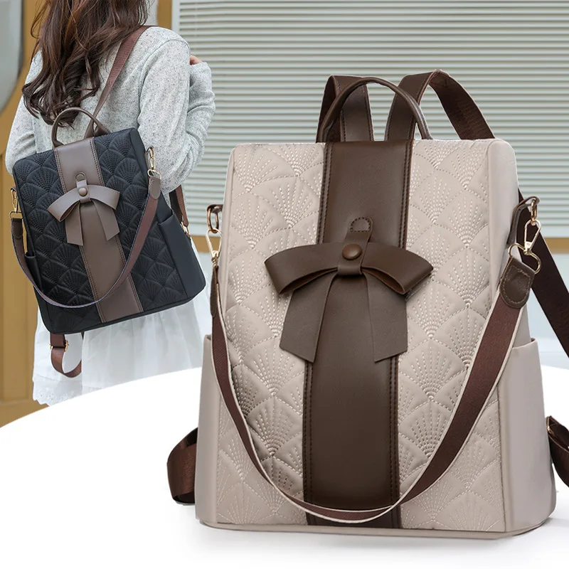 Lightweight nylon leather spliced women's backpack with contrasting colors and cute bow multi-purpose travel single-shoulder bag