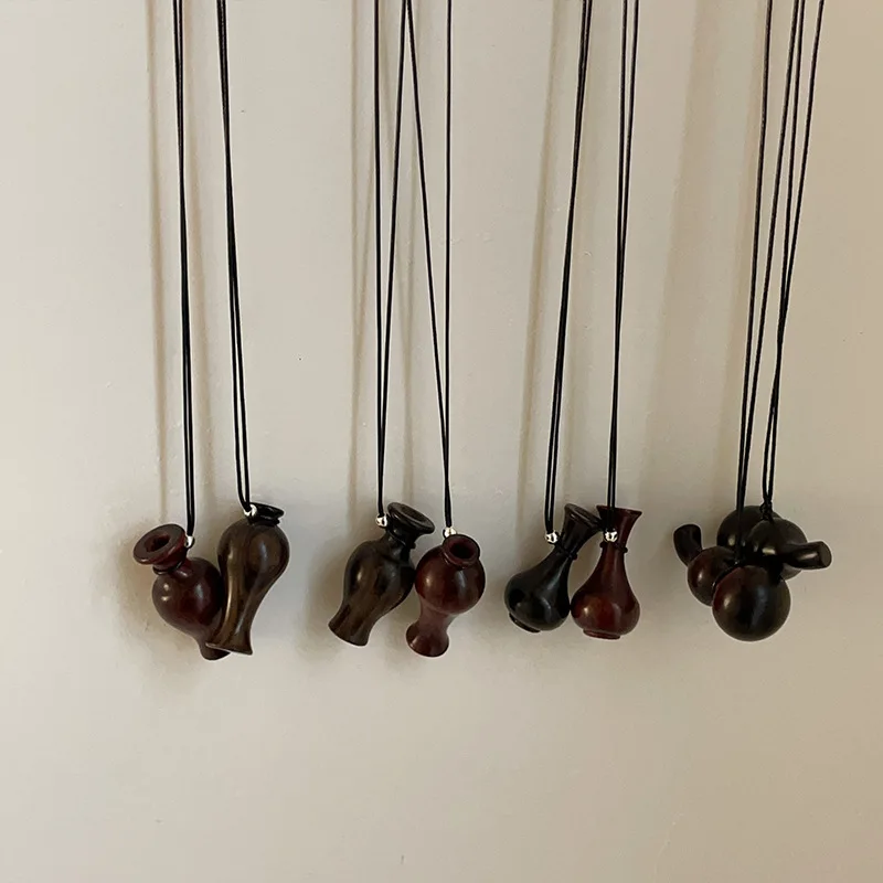 

Rosewood Wine Flask, Gourd Wooden Vase Pendant Necklace, Female Fashion Sweater Chain