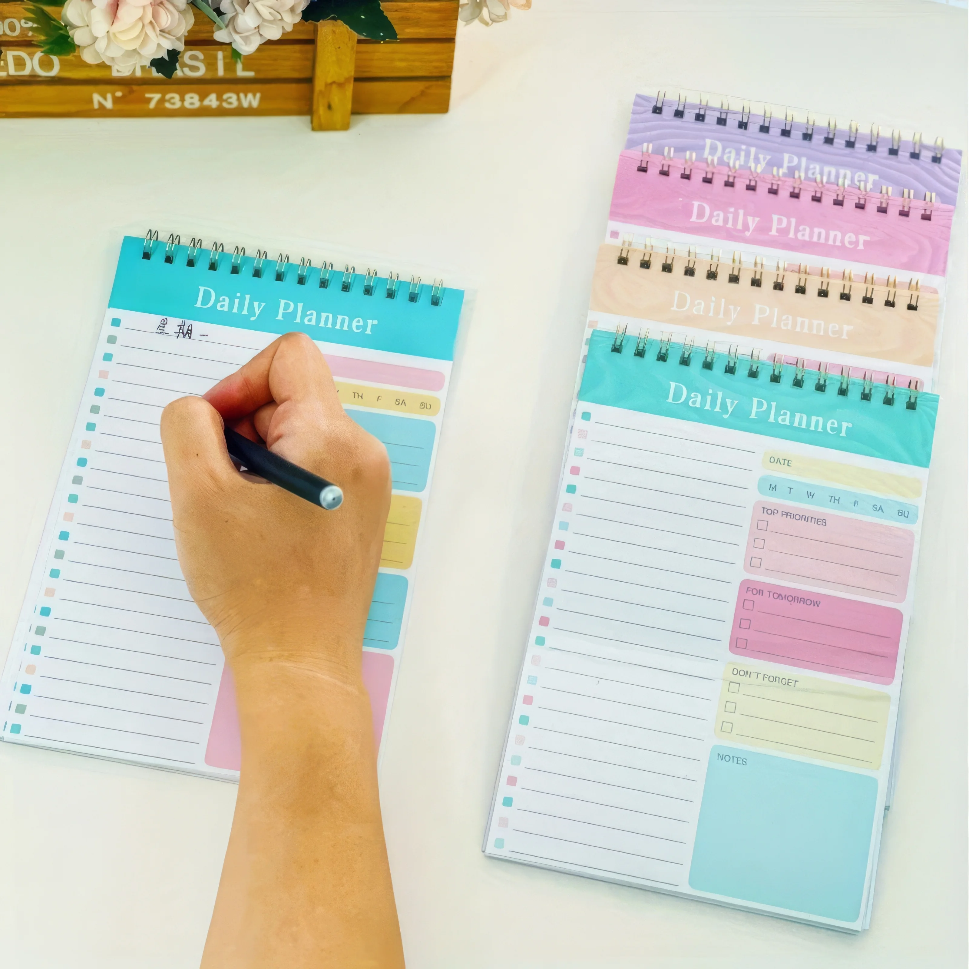 Colorful Large Daily Planner Notebook​ – One randomly selected vibrant color. Perfect for organizing your daily tasks