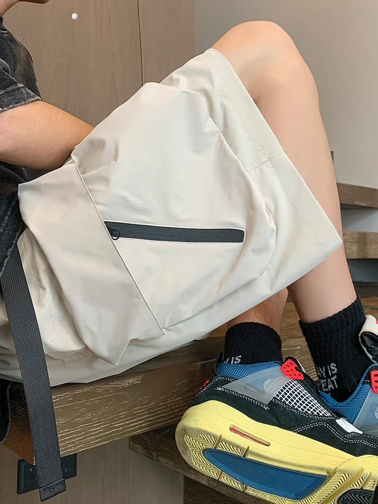 ملابس عمل Qui Dry orts للرجال صيفية من الحرير الجليدي بأرجل مستقيمة فضفاضة للمراهقين الأمريكية وظيفية مقاس كبير خمسة منافذ