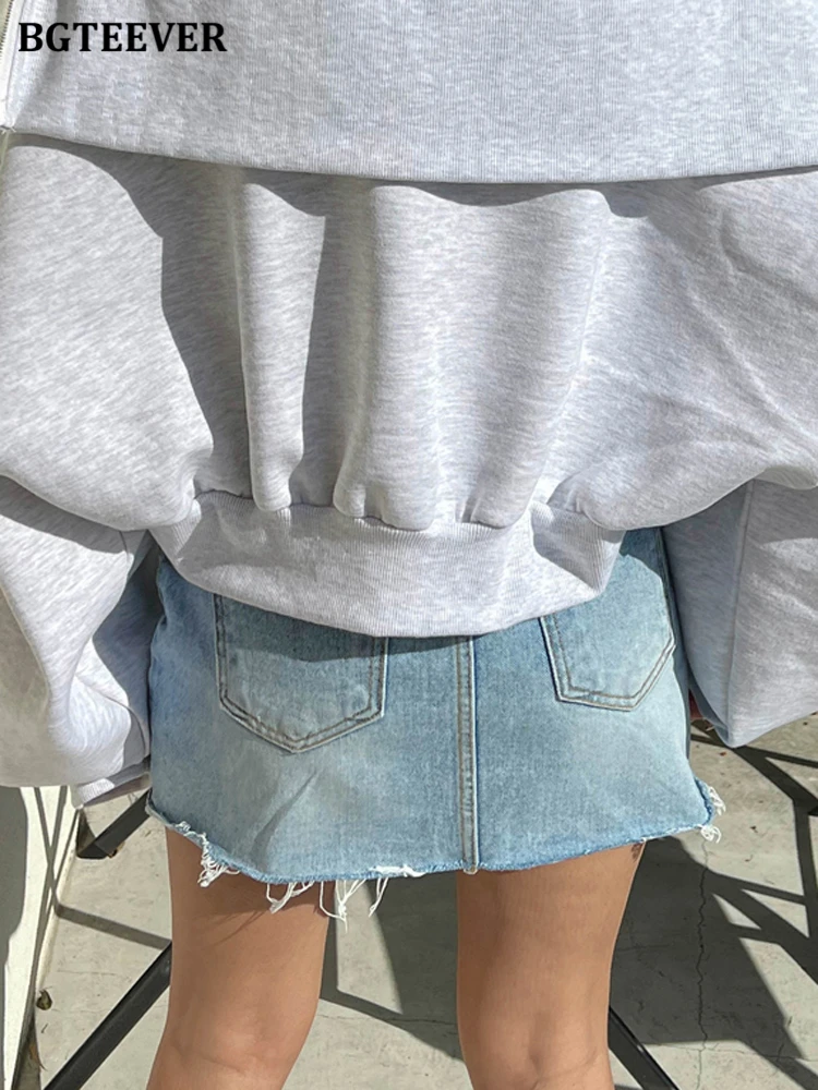 BGTEEVER Stylish Inclined Button Women Denim Skirts Fashion High Waist Pockets Tassel Hem Female Jeans Skirts Spring Summer