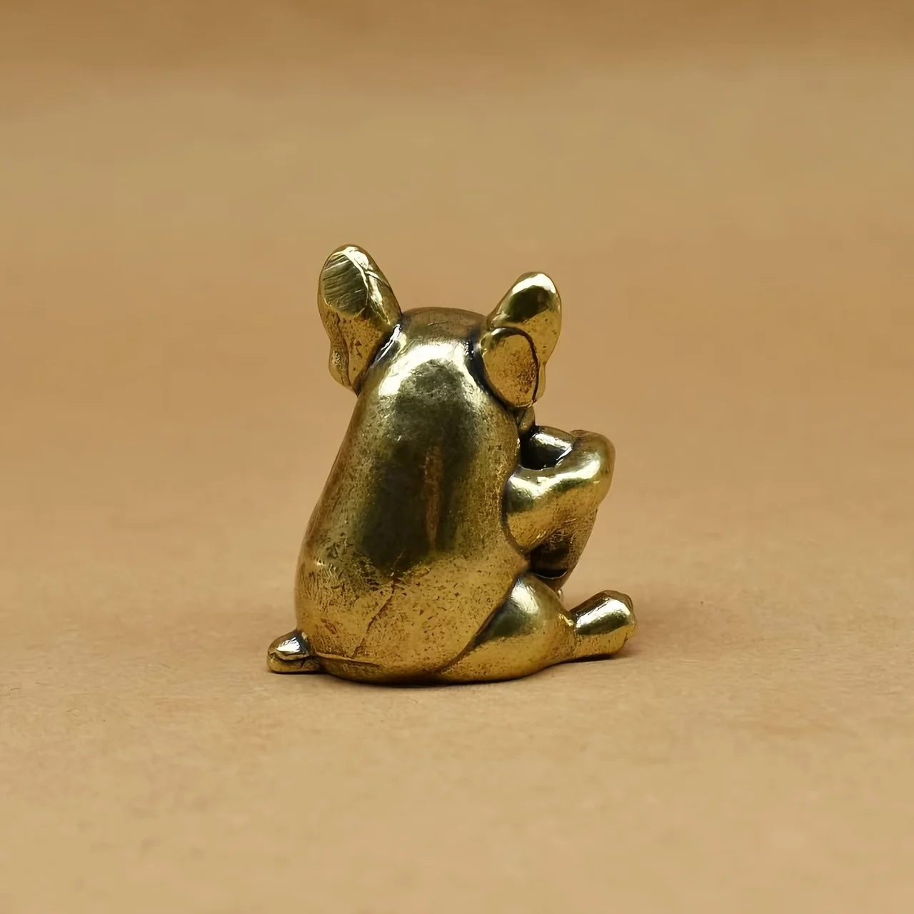 

Vintage brass French Bulldog statue, heart-shaped, handmade. Charming decor for home, desk, indoors/outdoors. Unique gift for