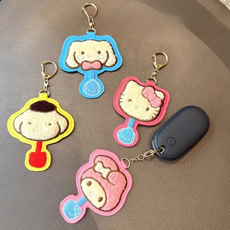 

Sanrios Cute Cartoon Exquisite Embroidery Hellokittys Keychain New Lollipop Shape My Melody Cinnamoroll Girl Bag Pendant Gift