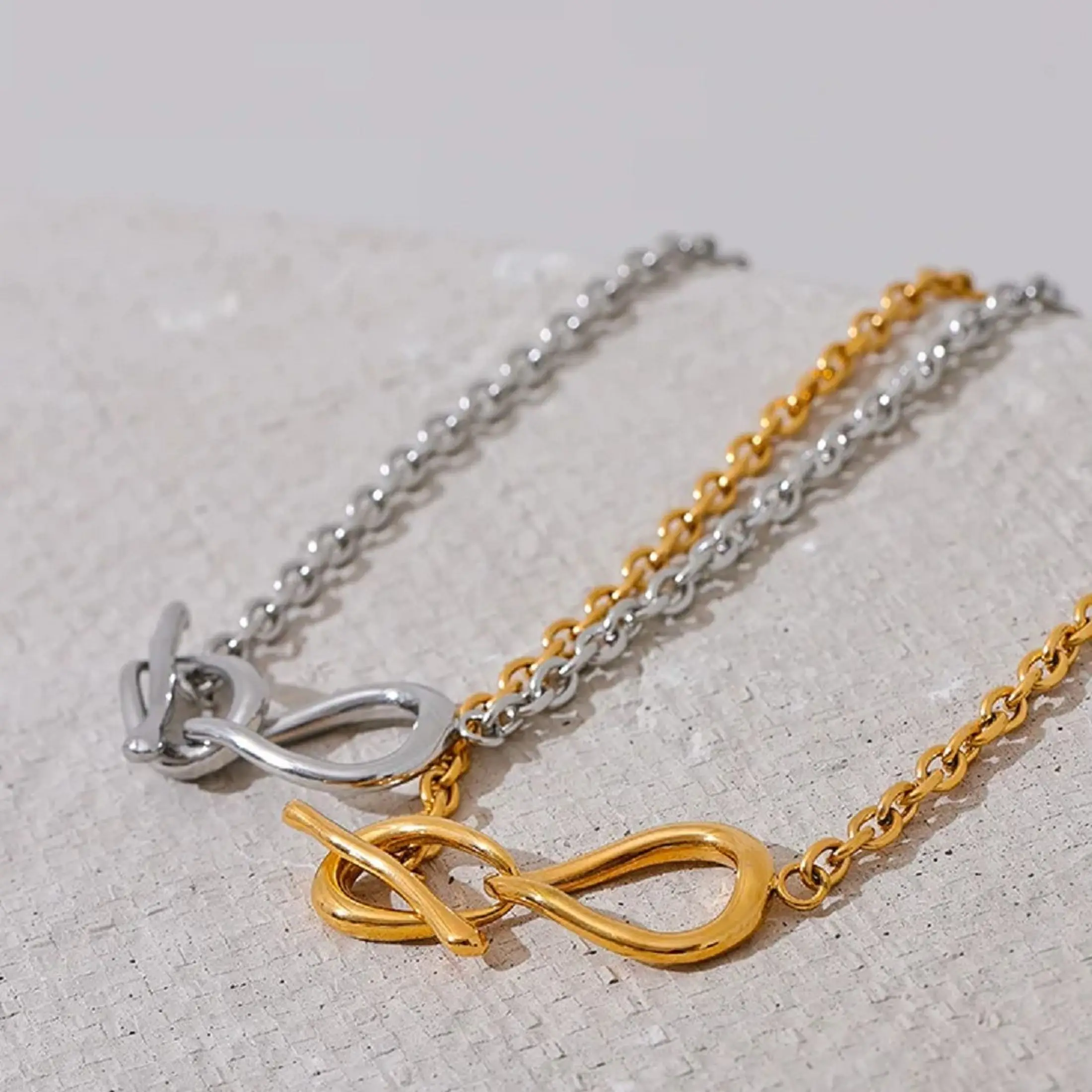 CARLIDANA Stainless Steel Waterproof Minimalist Romantic Infinity Love Knot Necklace Bow Shaped Links OT Buckle Necklace