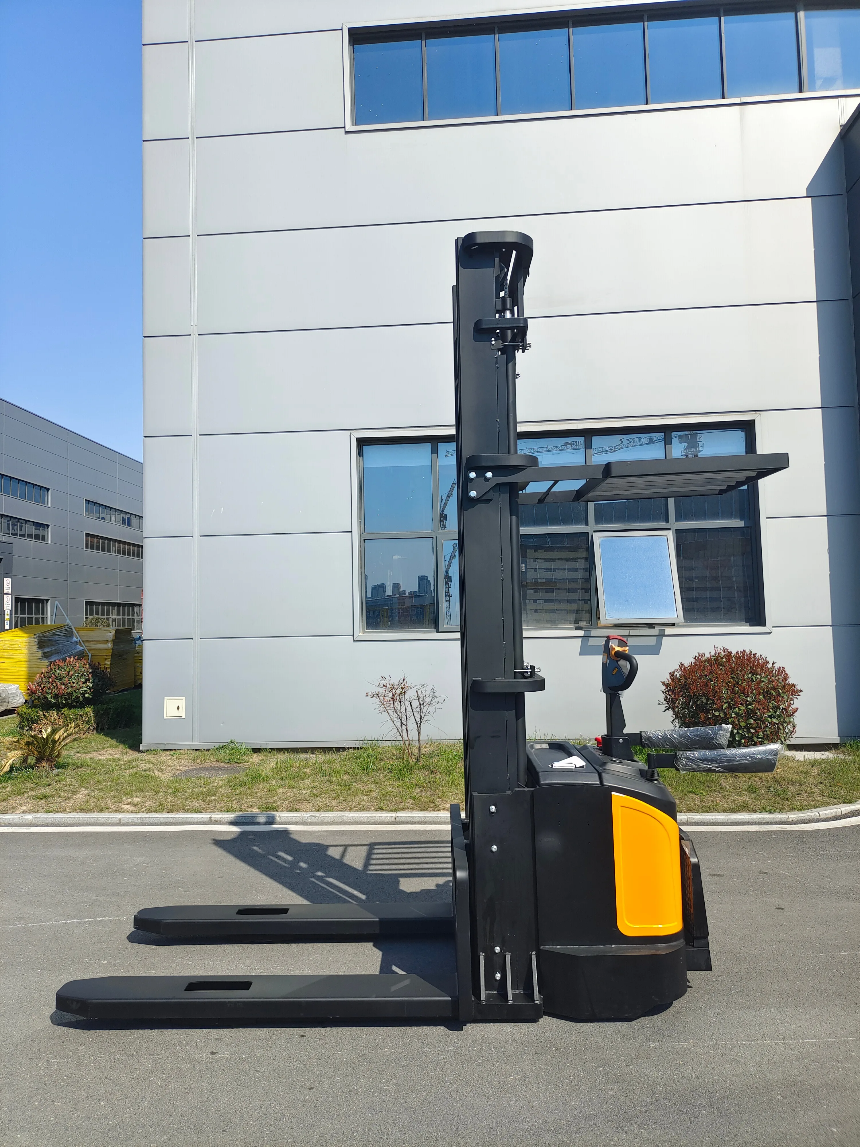 Hot Sale Small Electric Pallet Stacker 2Ton 3m Battery Standing-on Type Full Electric Battery Powered