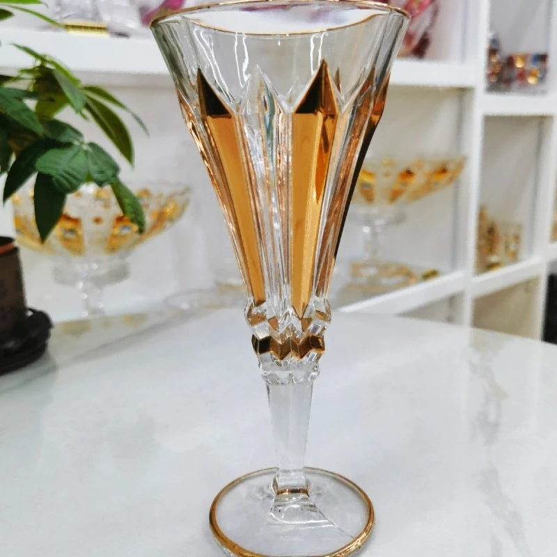 

Gold-painted crystal glass, tall wine glass, champagne pair