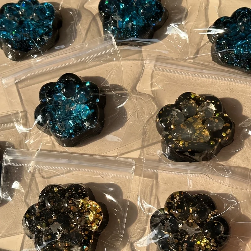 Juguete relajante blando con forma de pata de gato de galaxia: diseño de brillo azul translúcido y negro de crecimiento lento, divertido recuerdo de fiesta o regalo de cumpleaños para Gi