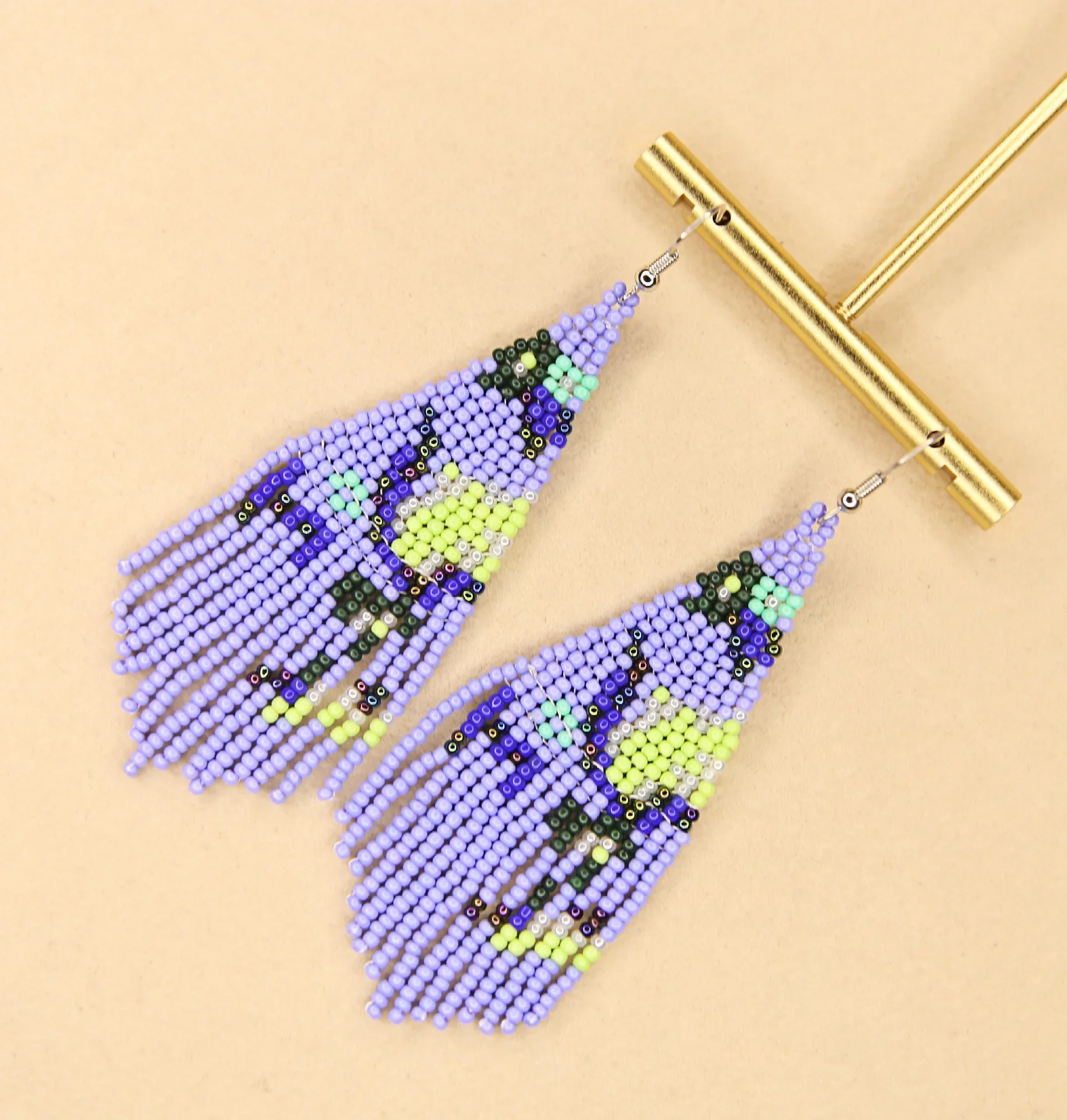 

Rice Bead Earrings Hand knitting Beaded Retro personality Simplicity Bohemia geometry alloy ma'am Tassel Earrings