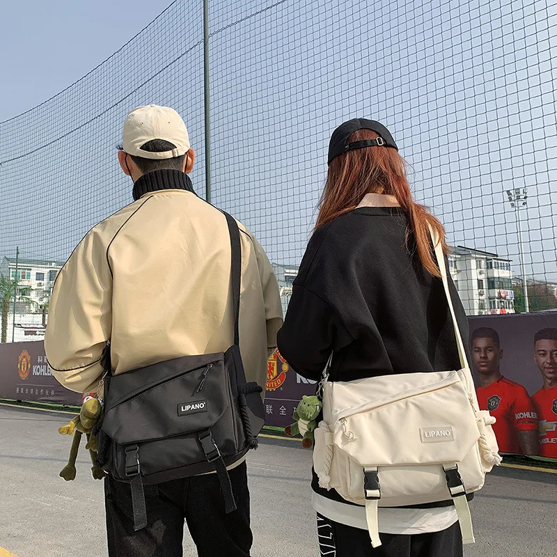 Borsa a tracolla da donna Borsa a tracolla da uomo di grande capacità Coreano giapponese Harajuku JK Borsa a tracolla per studenti in tela di moda