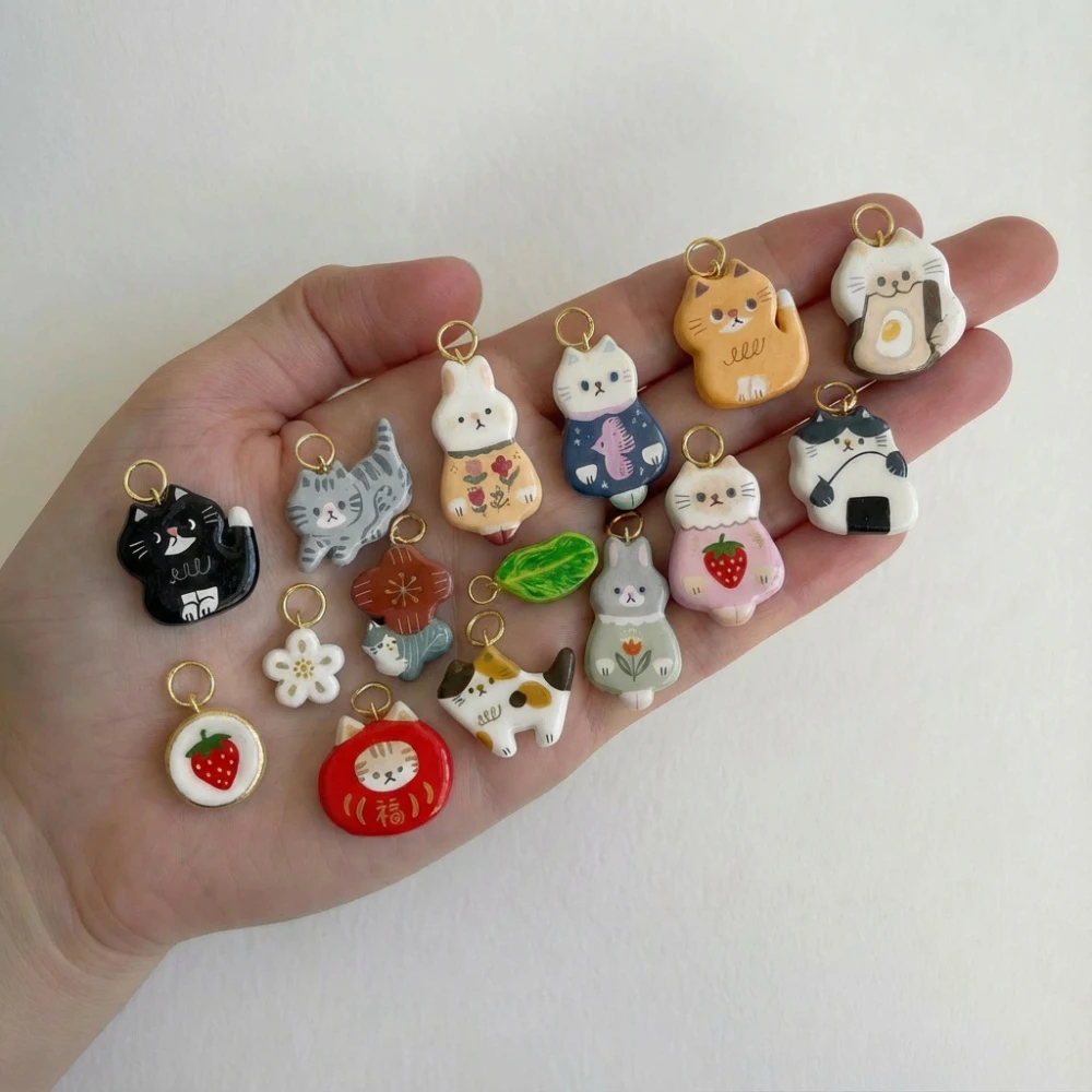 Niedliche und beliebte neue kleine Tierfiguren-Serie: Schwarzkäfigkatze, Blumenkatze, DIY-Anhänger für Schmuck. – Detail 1