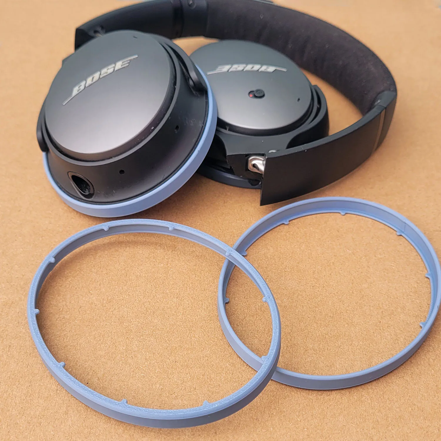A Custom-Designed Housing Trim of Bose QC25 headphone Speaker Plastic Shell Edge Decorative 0-ring.