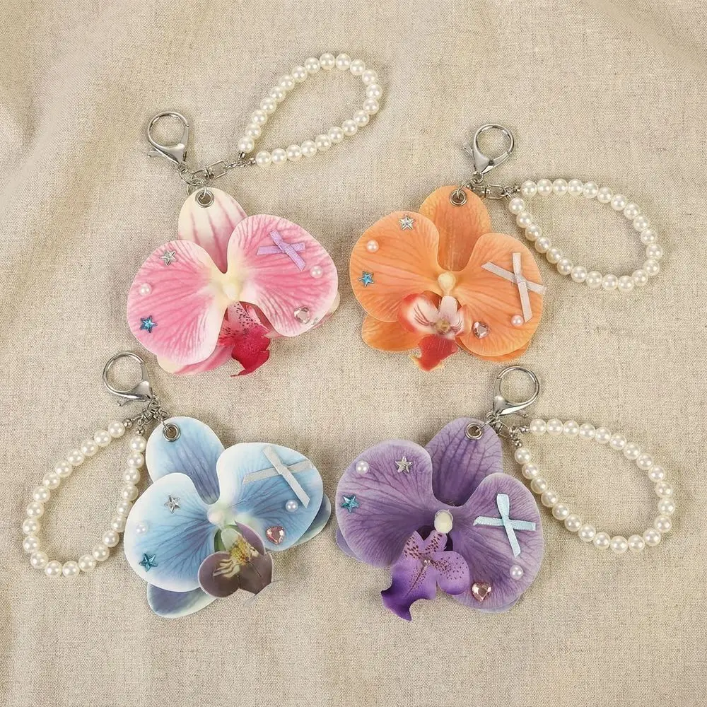 Modischer Bunter Simulationsblumen-Schlüsselanhänger Süßer Exquisiter Schmetterlingsorchideen-Schlüsselring Sternförmige Polyester-Rucksackdekoration für Frauen