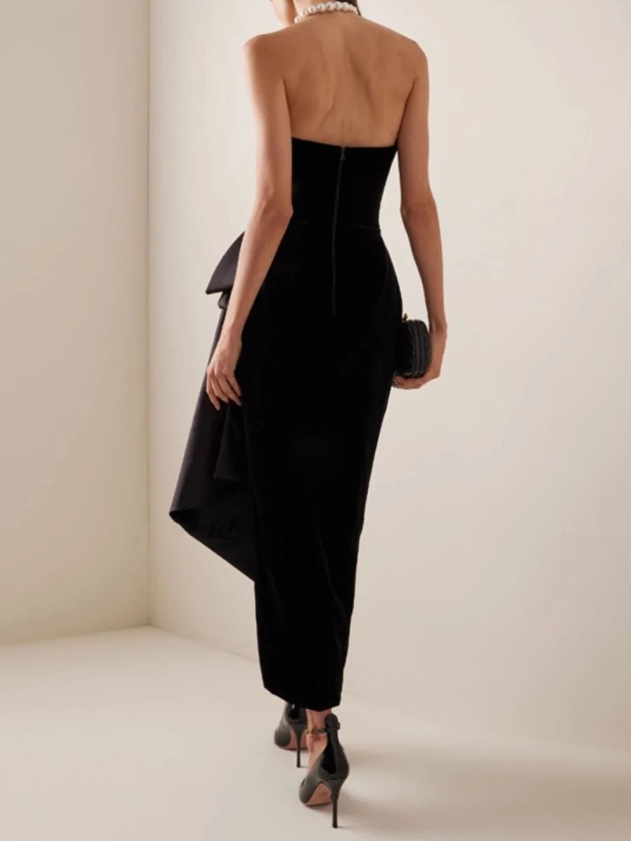 TWOTWINSTYLE Hit couleur épissé nœud papillon robes minceur pour les femmes sans bretelles sans manches taille haute tempérament longue robe femme