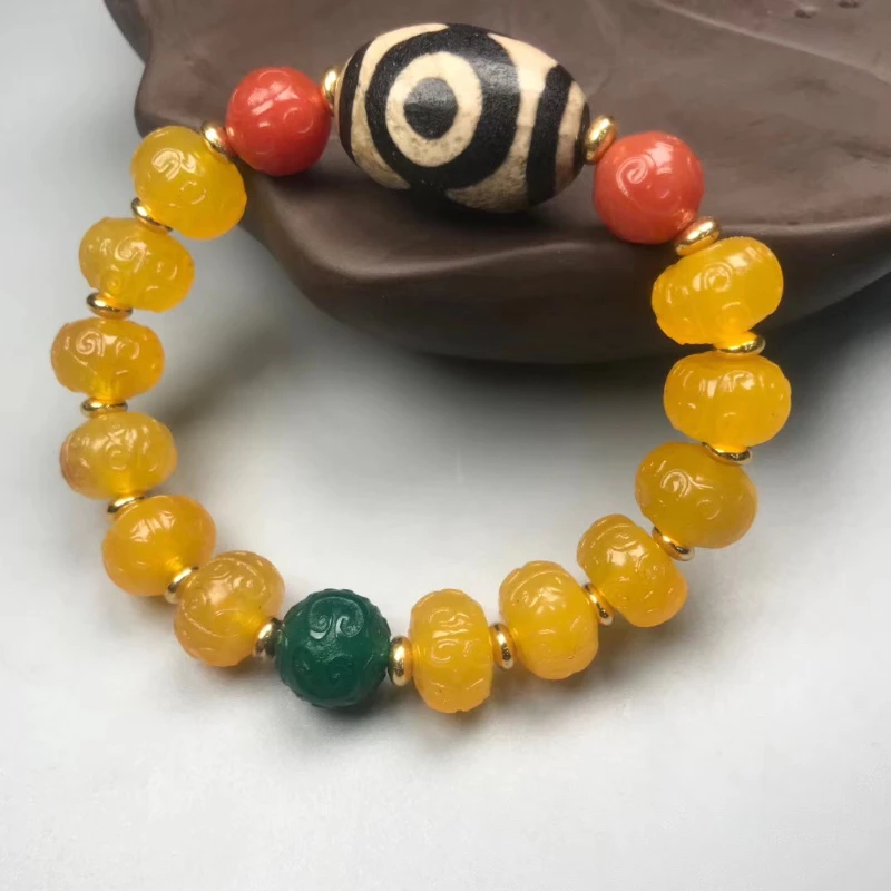 

Natural old yellow agate Ruyi back dragon pattern with old mine three-eye dzi beads bracelet single circle bracelet jewelry