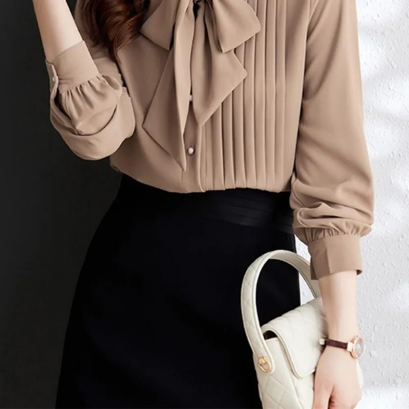 Women's 2024 Summer New Spliced Bow Neck Button Screw Thread Fashion Solid Slim Irregular Casual Long Sleeved Blouses Shirts