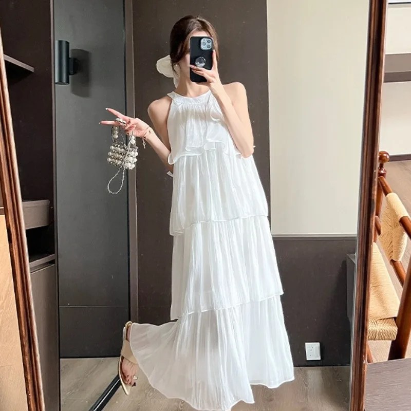 Vestido largo con cuello de temperamento francés para mujer, novedad de verano, vestido largo acampanado sin mangas con cuello redondo, vestido de vacaciones de Color sólido Fairycore