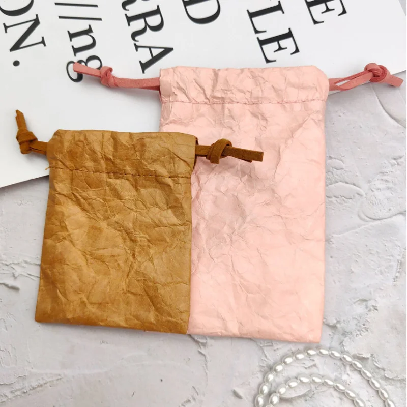 

Бумажные подарочные мешочки Tyvek с завязками, возможность нанесения логотипа, индивидуальный размер, стильный дизайн, мешочки для косметики и украшений.