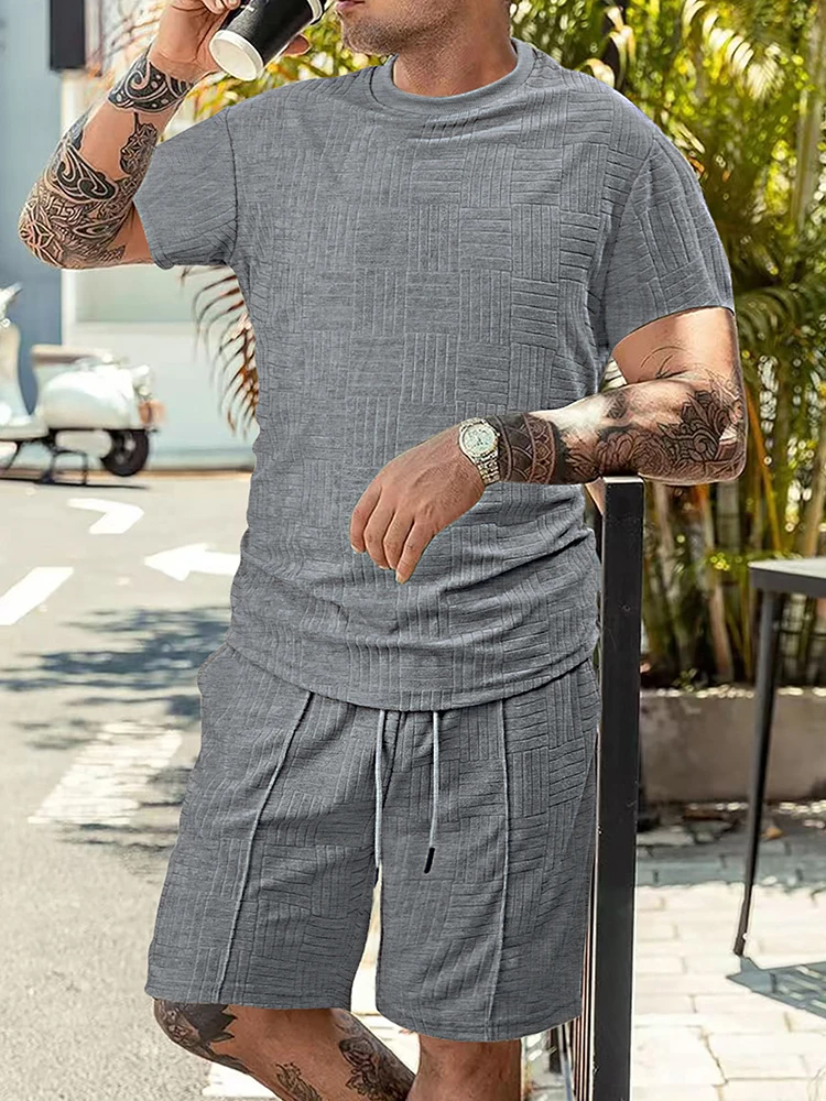 Abiti jacquard alla moda Uomo Estate Casual Tinta unita O Collo Manica corta T-shirt e pantaloncini Uomo Abiti a due pezzi Set larghi alla moda